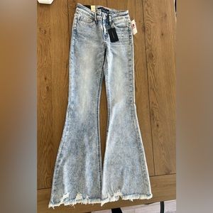 Flying Monkey Mid Rise Flare Jeans.